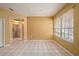Versatile flex room with tile flooring, natural light, and easy access to other living areas at 1914 Sassafras Dr, Wesley Chapel, FL 33543
