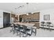 Spacious kitchen featuring a large island with seating, stainless steel appliances, and plenty of cabinet space at 200 Eppinger Dr, Port Charlotte, FL 33953