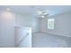 Upstairs bedroom with neutral paint, carpet and a window providing natural light at 208 English Heritage Pl, Dover, FL 33527
