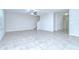Spacious living room features staircase, tile floors, ceiling fan at 208 English Heritage Pl, Dover, FL 33527