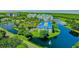 Beautiful condo community with lush landscaping, parking and a pond with fountains at 2333 Feather Sound Dr # B609, Clearwater, FL 33762
