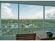 Expansive balcony view showcases the community, including its serene ponds and lush landscaping at 2333 Feather Sound Dr # B609, Clearwater, FL 33762