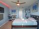 Comfortable bedroom with light blue walls, tasteful decor, and a spacious layout at 2333 Feather Sound Dr # B609, Clearwater, FL 33762