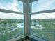Stunning corner unit view overlooking lush landscaping, serene ponds and a glimpse of community buildings at 2333 Feather Sound Dr # B609, Clearwater, FL 33762