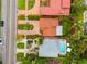 Aerial view of a home featuring a circular driveway, lush landscaping, pool and an outlined property at 243 Snell Isle Ne Blvd, St Petersburg, FL 33704