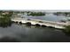 Scenic aerial view of bridge over bay with residences along the waterfront and lush green trees at 243 Snell Isle Ne Blvd, St Petersburg, FL 33704