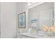 Elegant bathroom featuring a modern vanity and decorative artwork at 271 Monet Trl, Bradenton, FL 34212