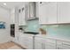 Bright kitchen with white cabinets and stainless steel appliances at 271 Monet Trl, Bradenton, FL 34212