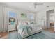 Bright main bedroom with large windows, ceiling fan and ensuite bathroom at 271 Monet Trl, Bradenton, FL 34212