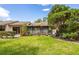A beautiful lawn and garden make up the backyard of this lovely property at 2922 60Th W St, Bradenton, FL 34209
