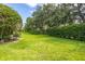 A well maintained lawn and manicured shrubbery make up this lovely yard at 2922 60Th W St, Bradenton, FL 34209