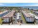 Aerial view of the condo complex showing two buildings and centrally-located covered parking at 3114 59Th S St # 101, Gulfport, FL 33707