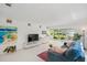 Bright living room with big windows and a comfortable seating area at 3114 59Th S St # 101, Gulfport, FL 33707