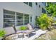 Charming outdoor seating area with decorative rocks and lush greenery at 3114 59Th S St # 101, Gulfport, FL 33707