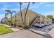 Exterior view of building with manicured landscape and ample parking space at 3206 W Azeele St # 120, Tampa, FL 33609