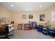 Basement with tan carpet and yellow walls used as an office and recreation space at 3831 Yardley N Ave, St Petersburg, FL 33713