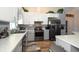 Contemporary kitchen with stainless steel appliances and stylish finishes at 3831 Yardley N Ave, St Petersburg, FL 33713