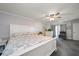 Relax in this spacious main bedroom featuring carpet floors and double doors at 3831 Yardley N Ave, St Petersburg, FL 33713