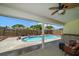 Sparkling pool surrounded by a well-maintained patio and privacy fence at 3831 Yardley N Ave, St Petersburg, FL 33713
