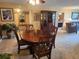 Cozy dining area featuring wood table, chairs, and stylish decor at 400 64Th Ave # 1105, St Pete Beach, FL 33706