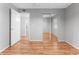 This bedroom has vinyl floors and a closet with mirrored doors at 4111 Whiting Se Dr, St Petersburg, FL 33705