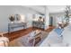 Inviting living area seamlessly connects to kitchen and dining, featuring modern decor, and natural light at 4111 Whiting Se Dr, St Petersburg, FL 33705