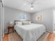 Light-filled main bedroom with a plush king-sized bed and neutral decor at 4111 Whiting Se Dr, St Petersburg, FL 33705