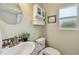 Well-lit bathroom featuring modern fixtures, decorative tile, and ample storage at 4211 28Th N Ave, St Petersburg, FL 33713