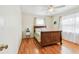 Charming bedroom with wood floors, a cozy bed, and plenty of natural light at 4211 28Th N Ave, St Petersburg, FL 33713