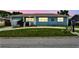 Charming single story home with a large circular driveway and well-manicured lawn at 4211 28Th N Ave, St Petersburg, FL 33713