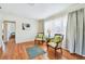 Bright living room with hardwood floors, comfortable seating, and natural light at 4211 28Th N Ave, St Petersburg, FL 33713