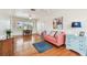 This sun-filled living room features hardwood floors and a relaxing seating area at 4211 28Th N Ave, St Petersburg, FL 33713