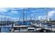 Lively marina scene with docked sailboats, blue skies, and reflections on the water at 4211 28Th N Ave, St Petersburg, FL 33713