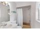 Bathroom with a bathtub, toilet, and sink with vanity at 4414 W Hanna Ave, Tampa, FL 33614