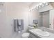 Full bathroom with light vanity and modern fixtures at 4414 W Hanna Ave, Tampa, FL 33614