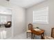 Cozy dining area featuring tile flooring and natural light at 4414 W Hanna Ave, Tampa, FL 33614