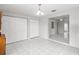Dining room with closet doors and view to living spaces at 4414 W Hanna Ave, Tampa, FL 33614