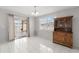Dining room area featuring sliding glass door to outside patio at 4414 W Hanna Ave, Tampa, FL 33614