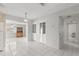 Open layout with living area, dining space and tile flooring at 4414 W Hanna Ave, Tampa, FL 33614