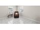 Comfortable living room with tile flooring and lots of natural light at 4414 W Hanna Ave, Tampa, FL 33614