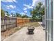 Spacious backyard with privacy fence, patio area, and fire pit at 4870 47Th N Ave, St Petersburg, FL 33714