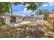 Backyard view with shed, patio, and partial view of the house, showcasing outdoor space at 4870 47Th N Ave, St Petersburg, FL 33714