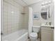Clean bathroom featuring a tub-shower combination and a vanity at 4870 47Th N Ave, St Petersburg, FL 33714