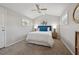 Bedroom with vaulted ceiling, ceiling fan, carpet flooring, and natural light at 4870 47Th N Ave, St Petersburg, FL 33714