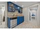 Remodeled kitchen with modern appliances, custom cabinets, and tiled backsplash at 4870 47Th N Ave, St Petersburg, FL 33714