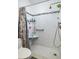 Bright bathroom showcasing a modern shower with a built-in seat at 505 67Th Ave # 11, St Pete Beach, FL 33706