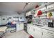 Bright kitchen with stainless appliances and lots of sunlight coming in through the doorway at 505 67Th Ave # 11, St Pete Beach, FL 33706