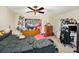 Spacious bedroom with a ceiling fan, perfect for unwinding after a long day at 5501 67Th N Ave # 11, Pinellas Park, FL 33781