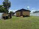 View of the home's exterior and backyard at 5807 N Hale Ave, Tampa, FL 33614