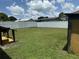 Fenced backyard with shed and grassy lawn at 5807 N Hale Ave, Tampa, FL 33614